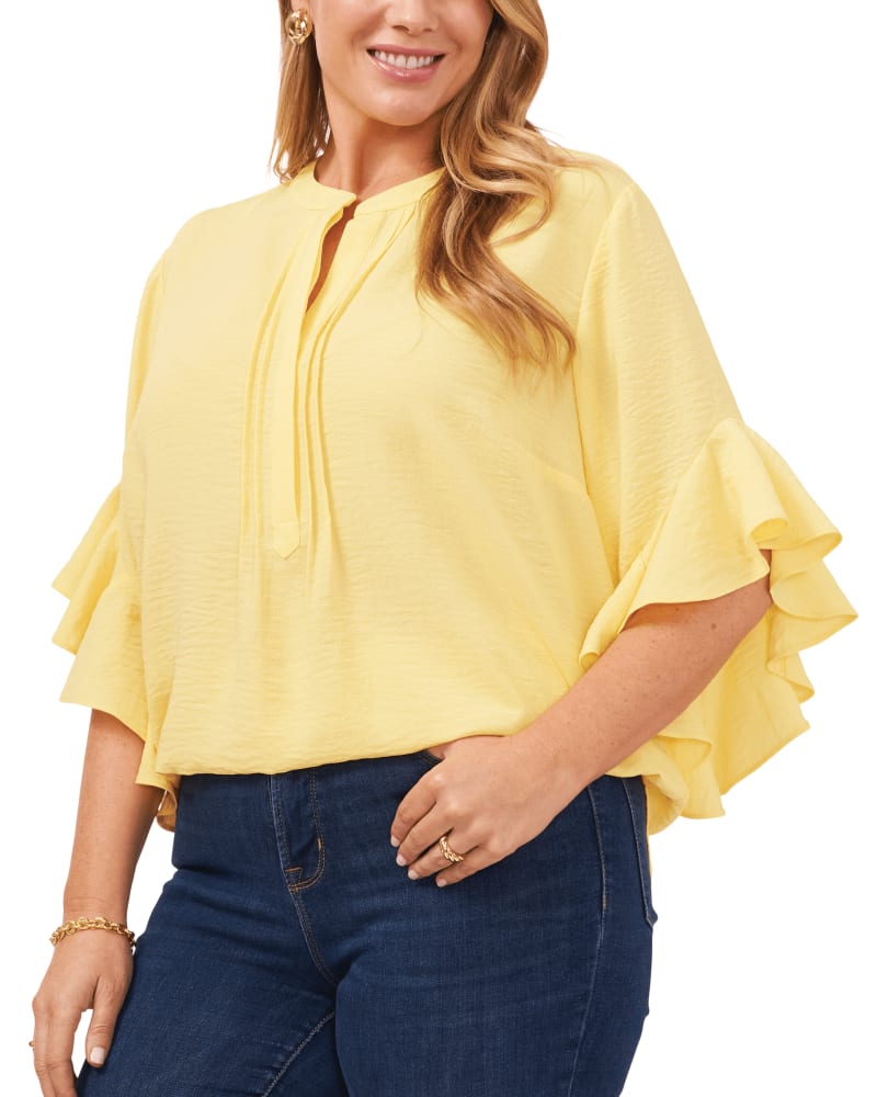 Front of a model wearing a size 1X Aubrey Ruffle Sleeve Blouse in SUNBURST by Vince Camuto. | dia_product_style_image_id:261674